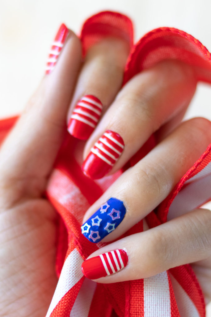 Try these simple 4th of July nails! Give yourself a DIY manicure for Independence Day with your favorite nail polishes! // #4thofjuly #nailideas #manicure #nailpolish #diybeauty