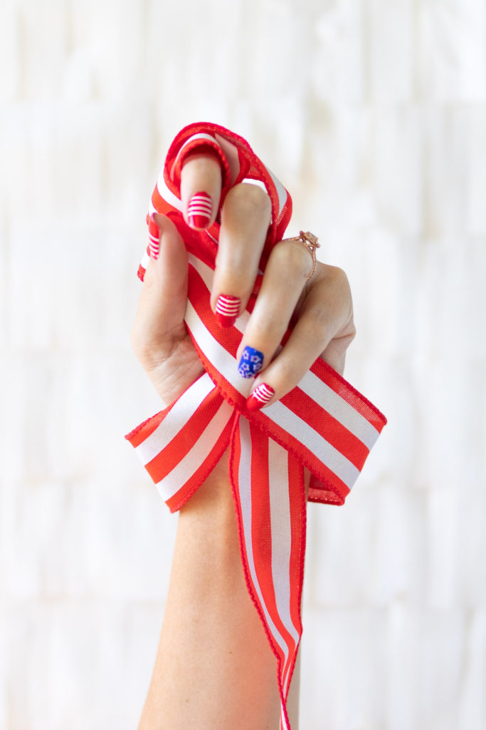 Try these simple 4th of July nails! Give yourself a DIY manicure for Independence Day with your favorite nail polishes! // #4thofjuly #nailideas #manicure #nailpolish #diybeauty