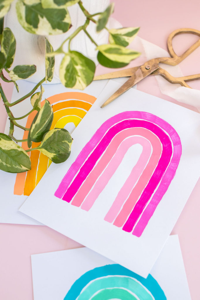 5-Minute Wall Art Idea! DIY Monochromatic Rainbow Art // Decorate with simple hand-painted monochromatic rainbows to make custom wall art in minutes! #wallart #homedecor #rainbows #papercrafts #cardstock #painting #monochromatic