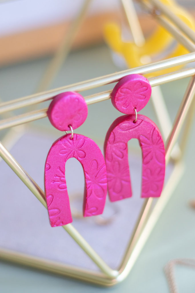 DIY Embossed Earrings with Clay // Make DIY statement earrings with this easy embossing technique for clay using paper embossing sheets! Use your favorite colors and shapes to make unique, lightweight DIY jewelry! #diyjewelry #statementearrings #fashiondiy #accessories #womensfashion #polymerclay #embossed #earrings #jewelry