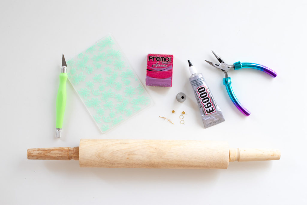 DIY Embossed Earrings with Clay // Make DIY statement earrings with this easy embossing technique for clay using paper embossing sheets! Use your favorite colors and shapes to make unique, lightweight DIY jewelry! #diyjewelry #statementearrings #fashiondiy #accessories #womensfashion #polymerclay #embossed #earrings #jewelry