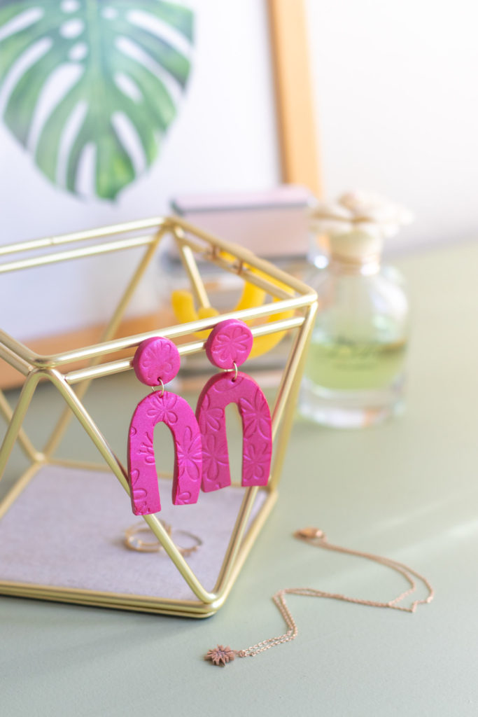 DIY Embossed Earrings with Clay // Make DIY statement earrings with this easy embossing technique for clay using paper embossing sheets! Use your favorite colors and shapes to make unique, lightweight DIY jewelry! #diyjewelry #statementearrings #fashiondiy #accessories #womensfashion #polymerclay #embossed #earrings #jewelry