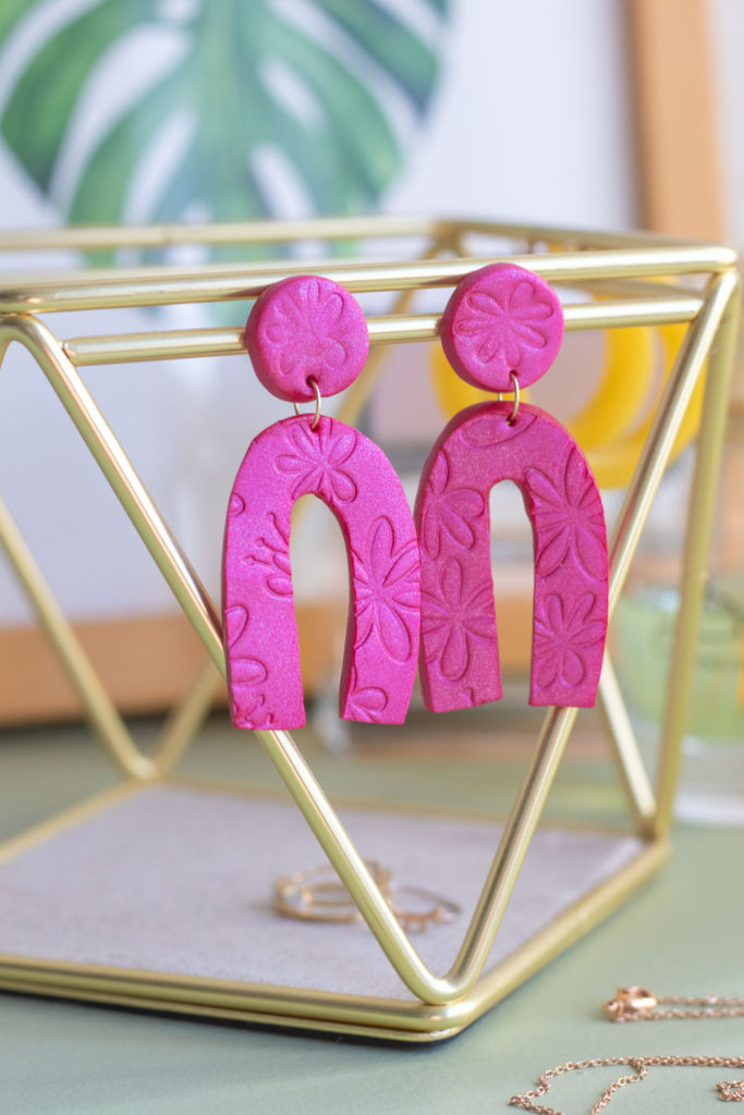 DIY Embossed Earrings with Clay // Make DIY statement earrings with this easy embossing technique for clay using paper embossing sheets! Use your favorite colors and shapes to make unique, lightweight DIY jewelry! #diyjewelry #statementearrings #fashiondiy #accessories #womensfashion #polymerclay #embossed #earrings #jewelry
