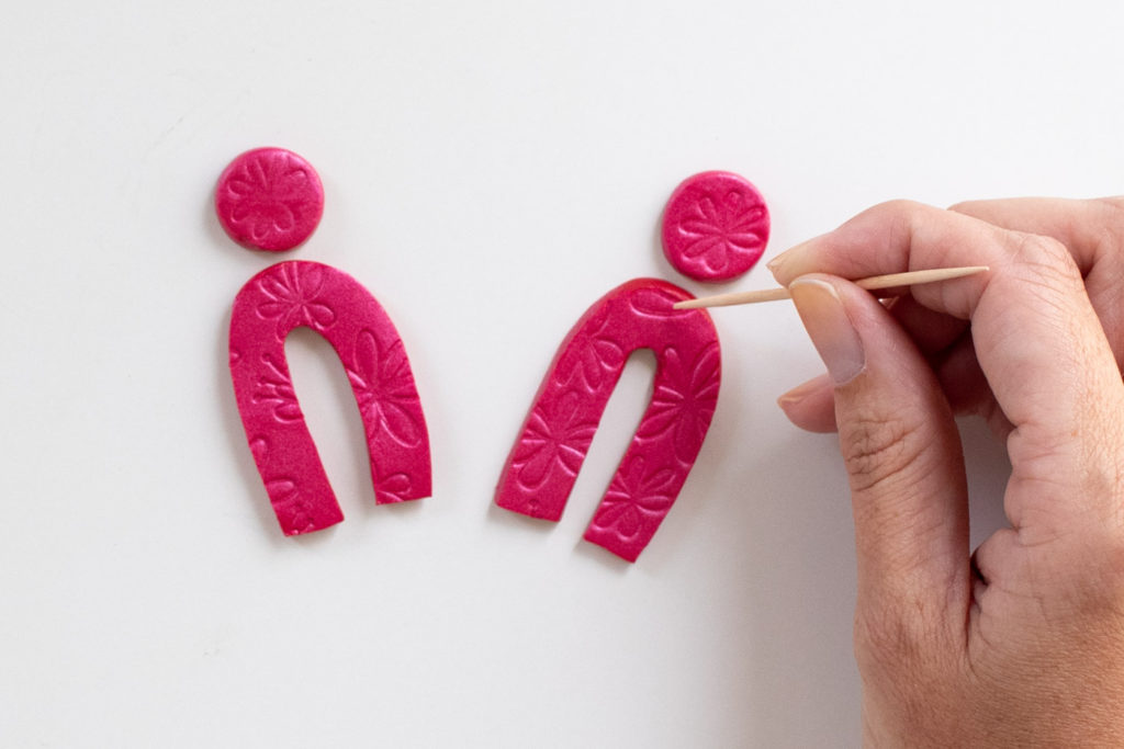 DIY Embossed Earrings with Clay // Make DIY statement earrings with this easy embossing technique for clay using paper embossing sheets! Use your favorite colors and shapes to make unique, lightweight DIY jewelry! #diyjewelry #statementearrings #fashiondiy #accessories #womensfashion #polymerclay #embossed #earrings #jewelry