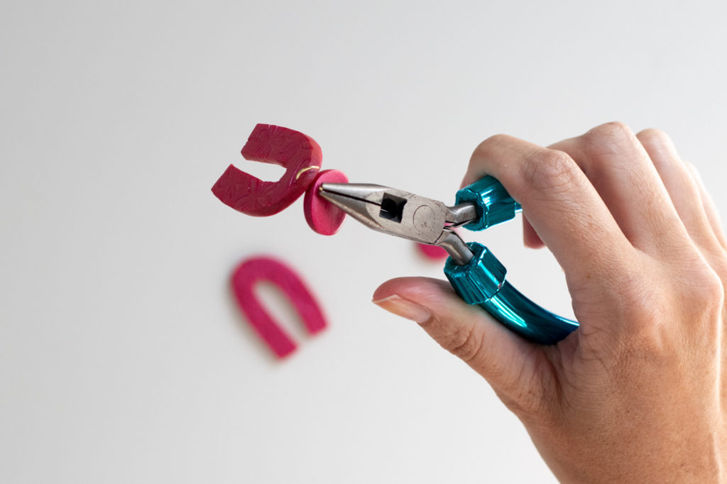DIY Embossed Earrings with Clay // Make DIY statement earrings with this easy embossing technique for clay using paper embossing sheets! Use your favorite colors and shapes to make unique, lightweight DIY jewelry! #diyjewelry #statementearrings #fashiondiy #accessories #womensfashion #polymerclay #embossed #earrings #jewelry