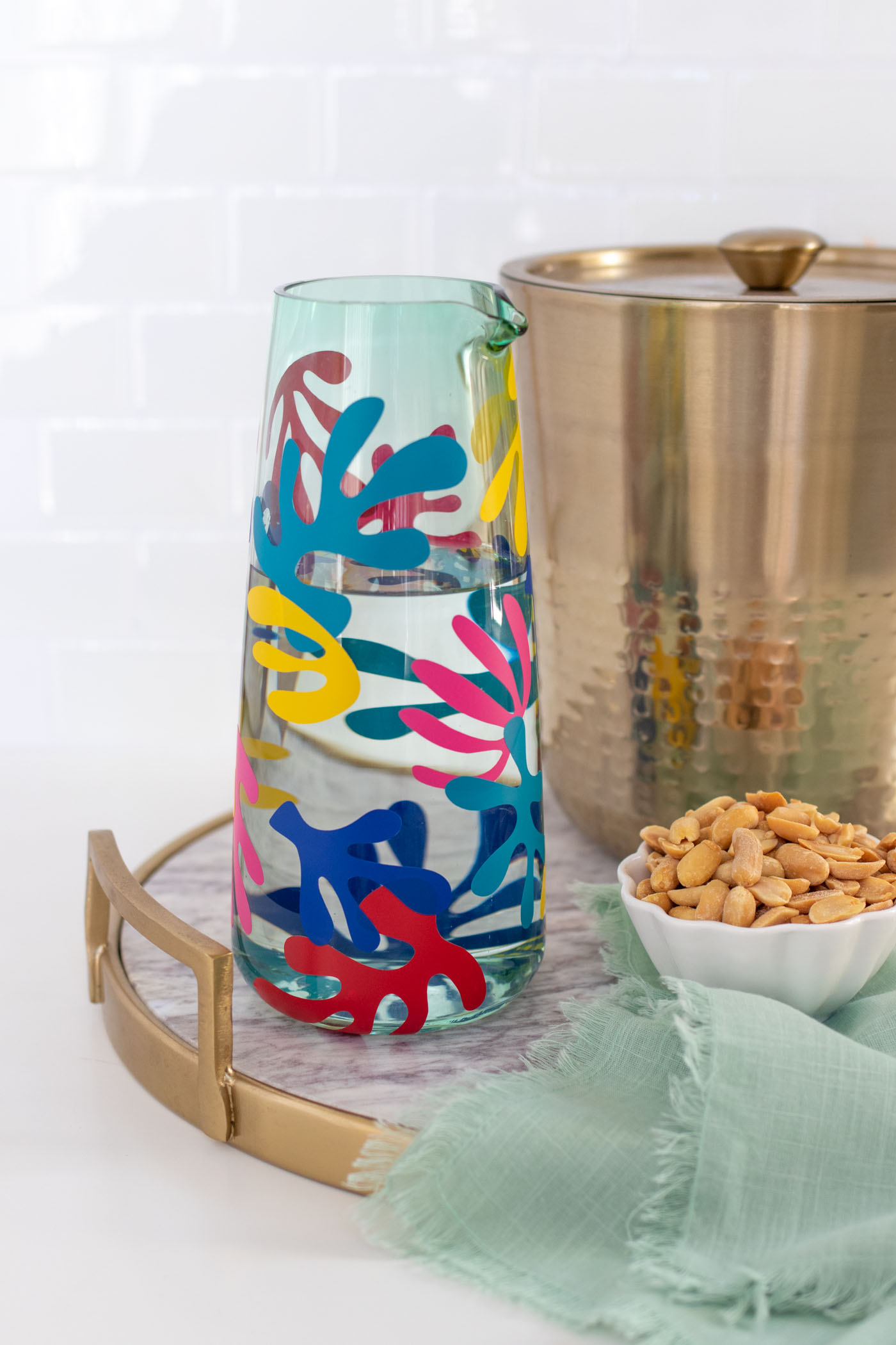 DIY Matisse Pitcher with Cricut // How to cut vinyl with Cricut for making a matisse-inspired pitcher with colorful abstract prints! Download the free SVG cut files for Cricut or Silhouette #homedecor #freedownload #vinyl #diydecor #freetemplate #entertaining #summerdecor