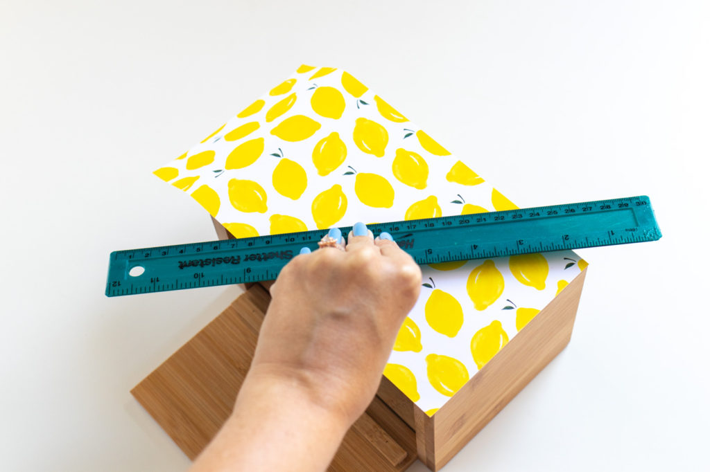 DIY Recipe Box Makeover with Wallpaper // Use removable wallpaper to makeover a simple wood recipe box! Add printable recipe cards and cute dividers to organize recipes in style! #diyideas #homedecor #recipecards #papercrafts #wallpaper #easydiy #giftideas #diygifts #diystorage #storageideas