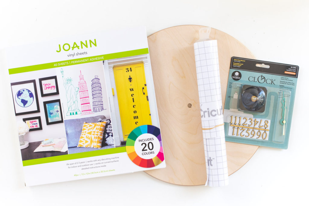 DIY Terrazzo Clock with Vinyl (Free SVG Template!) // Use your Cricut or Silhouette machine to add a colorful terrazzo pattern to a wooden clock with @joann branded adhesive vinyl packs! Simply cut and layer for a unique pieces of wall art using this free cut template! #handmadewithjoann #vinyl #freetemplate #wallart #homedecor #diydecor #terrazzo #cricutmade
