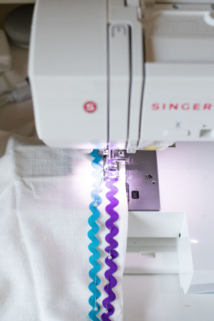 DIY Rainbow RickRack Dress // How to Sew RickRack // Learn the easy way to sew rick rack with this sewing tutorial to update a dress for summer with cute rainbow trim! #sewing #womensfashion #rickrack #howtosew #rainbow #fabricprojects #diyideas