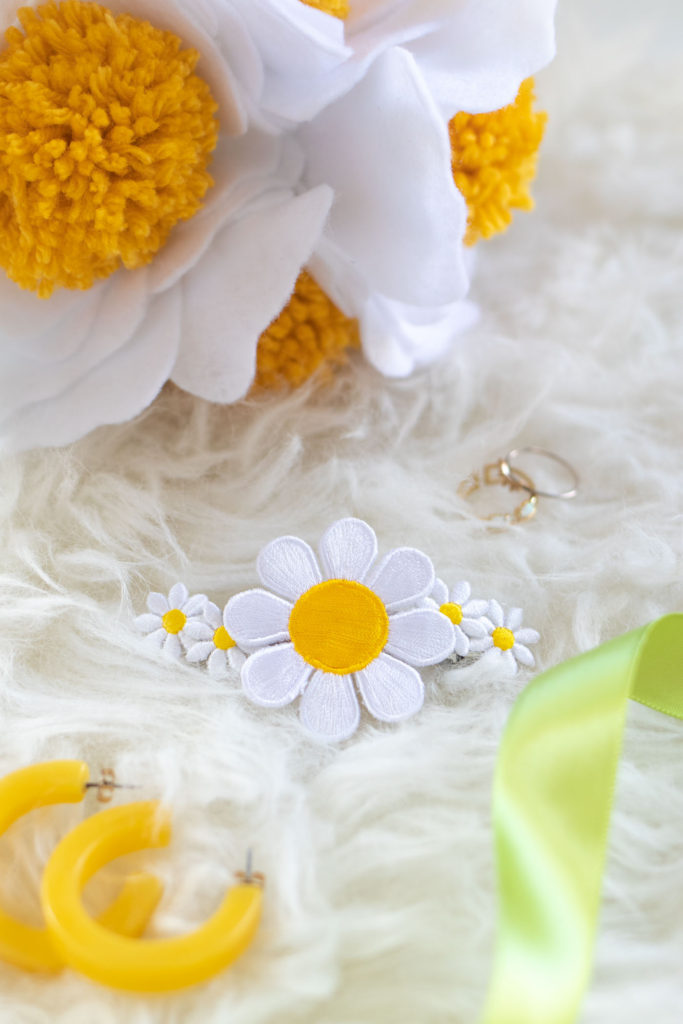 DIY Floral Patch Barrette for your Hair // Try this 5-minute DIY for updating a hair barrette with iron-on patches! I bet you didn't know there were more uses for iron-on patches than decorating your fav denim jacket! #hairstyle #hairpin #beautydiy #diystyle #patches #90sstyle #womensfashion #diyfashion #hairideas