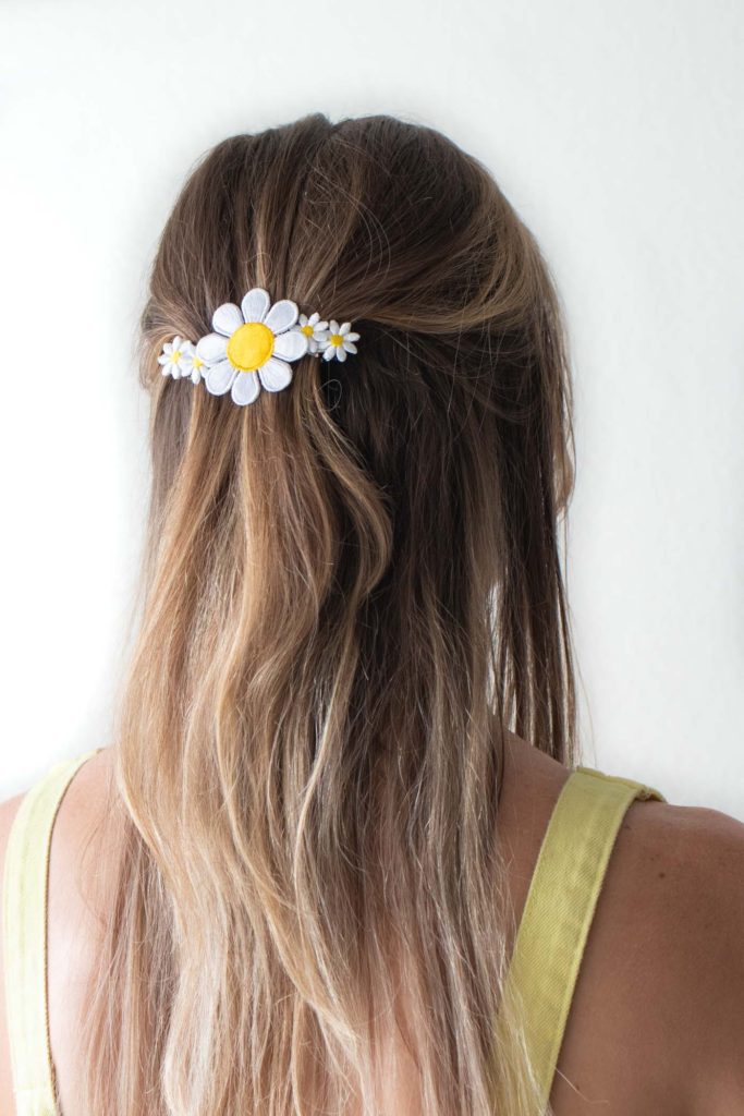DIY Floral Patch Barrette for your Hair // Try this 5-minute DIY for updating a hair barrette with iron-on patches! I bet you didn't know there were more uses for iron-on patches than decorating your fav denim jacket! #hairstyle #hairpin #beautydiy #diystyle #patches #90sstyle #womensfashion #diyfashion #hairideas