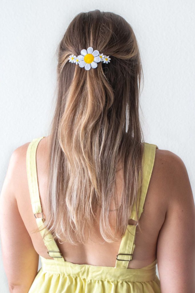 DIY Floral Patch Barrette for your Hair // Try this 5-minute DIY for updating a hair barrette with iron-on patches! I bet you didn't know there were more uses for iron-on patches than decorating your fav denim jacket! #hairstyle #hairpin #beautydiy #diystyle #patches #90sstyle #womensfashion #diyfashion #hairideas