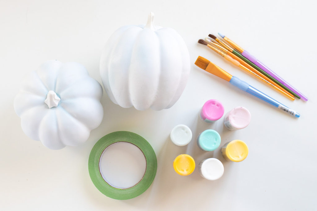 Painted Pumpkin Idea! DIY Gingham Pumpkins // Decorate pumpkins with a fun gingham pattern to decorate for Halloween with color! Use two-tone paints to make colorful Halloween decor 🎃 #pumpkin #halloween #halloweendiy #painting #gingham #diydecor #holidaydiy #falldecor #falldiy