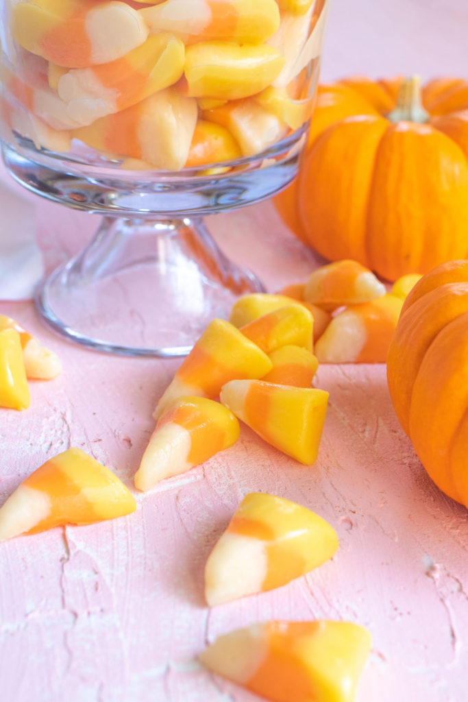 Easy Candy Corn Fudge // Make white chocolate fudge with honey that looks just like pieces of candy corn! This 3-ingredient fudge is the perfect Halloween treat for kids and adults! #candycorn #candy #fudgerecipes #whitechocolate #halloweensnacks #fallsnacks #fall #halloween #halloweentreats