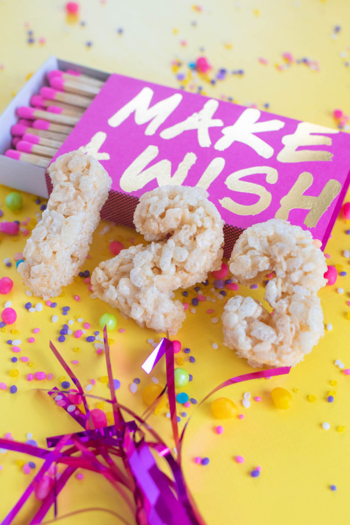 Number Rice Krispies Treats for Birthdays // Celebrate any occasion with a party treat for kids AND adults! Use cookie cutters to cut numbers from homemade rice krispies treats to celebrate birthdays! #ricekrispies #snacks #birthdayparty #birthday #partyfood #cereal #snackrecipes #easyrecipes