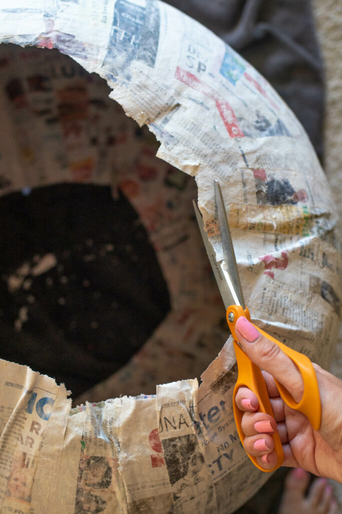 DIY Crystal Ball Costume for Halloween // Use paper mache on a large balloon to create a DIY halloween costume that looks like a mystical crystal ball used by a fortune teller! #crystalball #papermache #halloween #costume #kidscostume #adultcostume