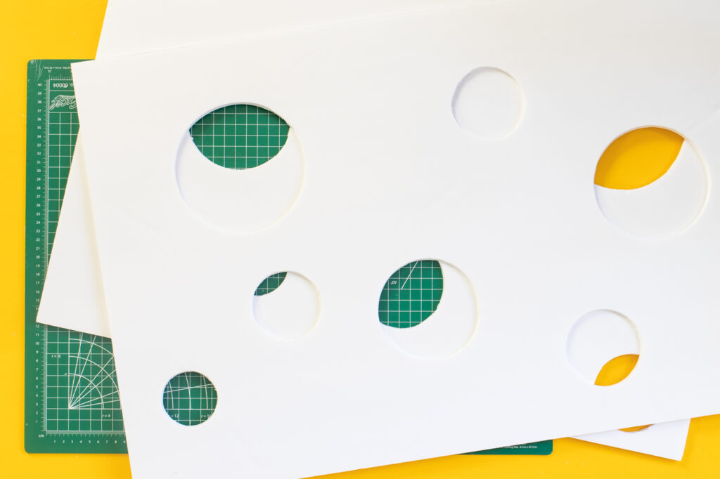 DIY Easy Cheese Costume (Cheeseboard Costume) // Use poster board to make a fun cheesy costume complete with a wedge of cheese headband! This easy last-minute costume is perfect for kids or adults to wear this Halloween #costume #easycostume #diycostume #halloween #adultcostumes #kidscostumes #cheese #posterboard