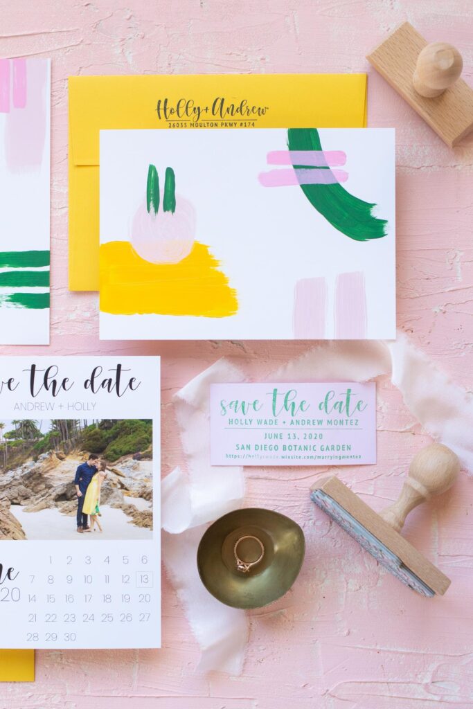 Our DIY Hand-Painted Save the Dates // See how I designed my own wedding save the dates with a hand-painted designs on the backs! Combined with custom stamps, simple magnets and printed envelopes, every element of these save the date invitations feels homemade and personal #weddingdiy #diywedding #weddinginvites #savethedates #papercrafts #handpainted #invitations