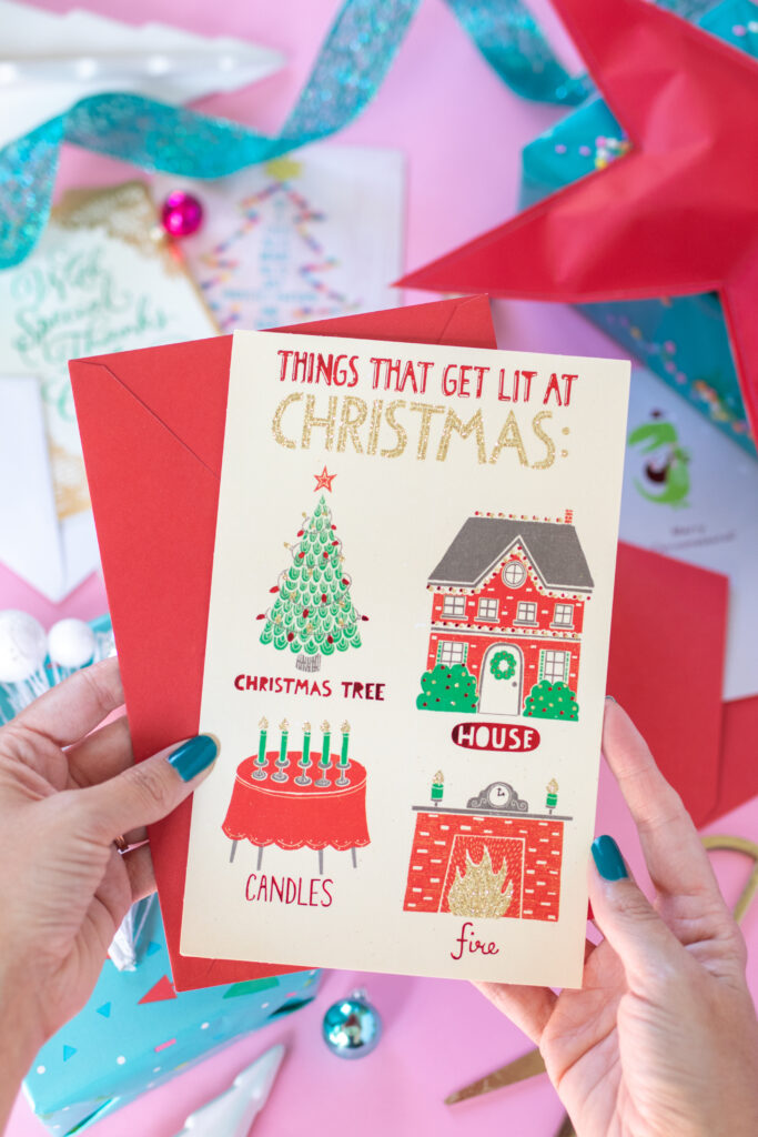 Unique Ways to Package Gifts this Season // Wrap up your holiday gifts with love and a little DIY flair with these tips! Use unique garnishes, recycled items, layers of gift wrap and more to wrap your holiday gifts, and add a sweet or funny holiday card from @amgreetings! #ad #holidaygifts #giftwrap #giftideas #wrapping #christmas #diygifts #christmasgift