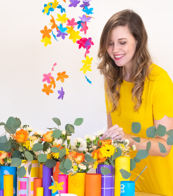 Colorful Spring Party with DIY Paper Decor / Use vibrant Astrobrights cardstock to create a variety of paper party decor for a spring celebration! Whether you're celebrating a Mother's Day brunch, bachelorette weekend or just-because party, thes bright spring party ideas will POP! Make paper wrapped vases as a unique centerpiece accompanied by a paper floral chandelier, floral straws, paper napkin rings and simple homemade confetti #ad #partyideas #springdecor #papercrafts #diyparty #partydecor #paperparty #paperdecor #mothersday #easterbrunch #rainbowparty #floraldecor #birthdayparty #springparty