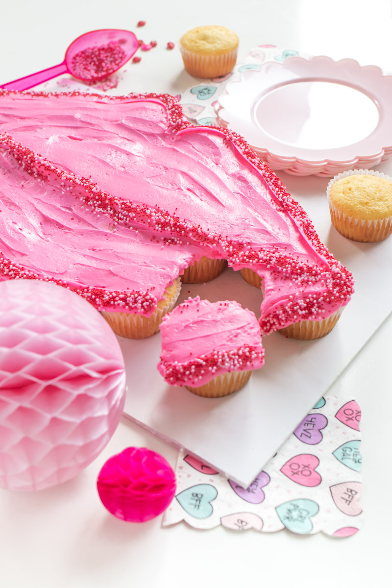 Lips Pull-Apart Cupcakes for Valentine's Day // Lips Cupcake Cake // Celebrate V-Day or Galentine's Day with an easy cupcake cake in the shape of lips! Simple arrange cupcake and decorate for an easy cake decorating hack for adults or kids! #valentinesday #galentinesday #vday #cakedecorating #cupcakes #cakehack #partyfood #partydessert
