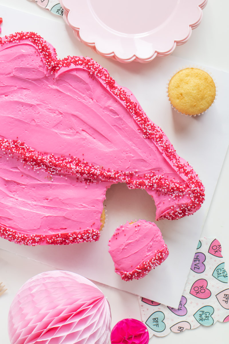 Lips Pull-Apart Cupcakes for Valentine's Day // Lips Cupcake Cake // Celebrate V-Day or Galentine's Day with an easy cupcake cake in the shape of lips! Simple arrange cupcake and decorate for an easy cake decorating hack for adults or kids! #valentinesday #galentinesday #vday #cakedecorating #cupcakes #cakehack #partyfood #partydessert