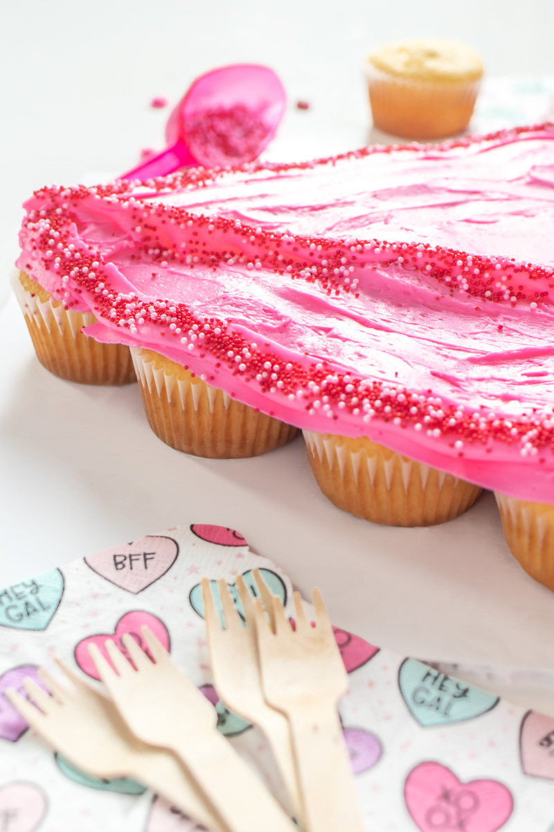 Lips Pull-Apart Cupcakes for Valentine's Day // Lips Cupcake Cake // Celebrate V-Day or Galentine's Day with an easy cupcake cake in the shape of lips! Simple arrange cupcake and decorate for an easy cake decorating hack for adults or kids! #valentinesday #galentinesday #vday #cakedecorating #cupcakes #cakehack #partyfood #partydessert