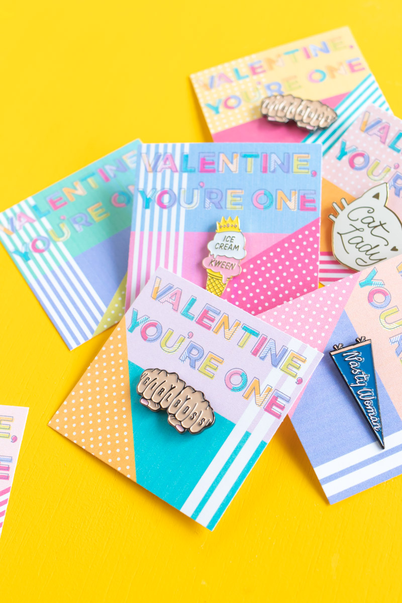 Printable Pin Cards for Galentine's Day // Use this cute 80s-inspired printable valentine to add an enamel pin for a sweet Valentine's Day gift! These colorful pin cards also make excellent Galentine's Day gifts #valentinesday #printable #galentinesday #vdaydiy #valentinesdaycrafts #diyvalentine #giftideas #giftsforwomen