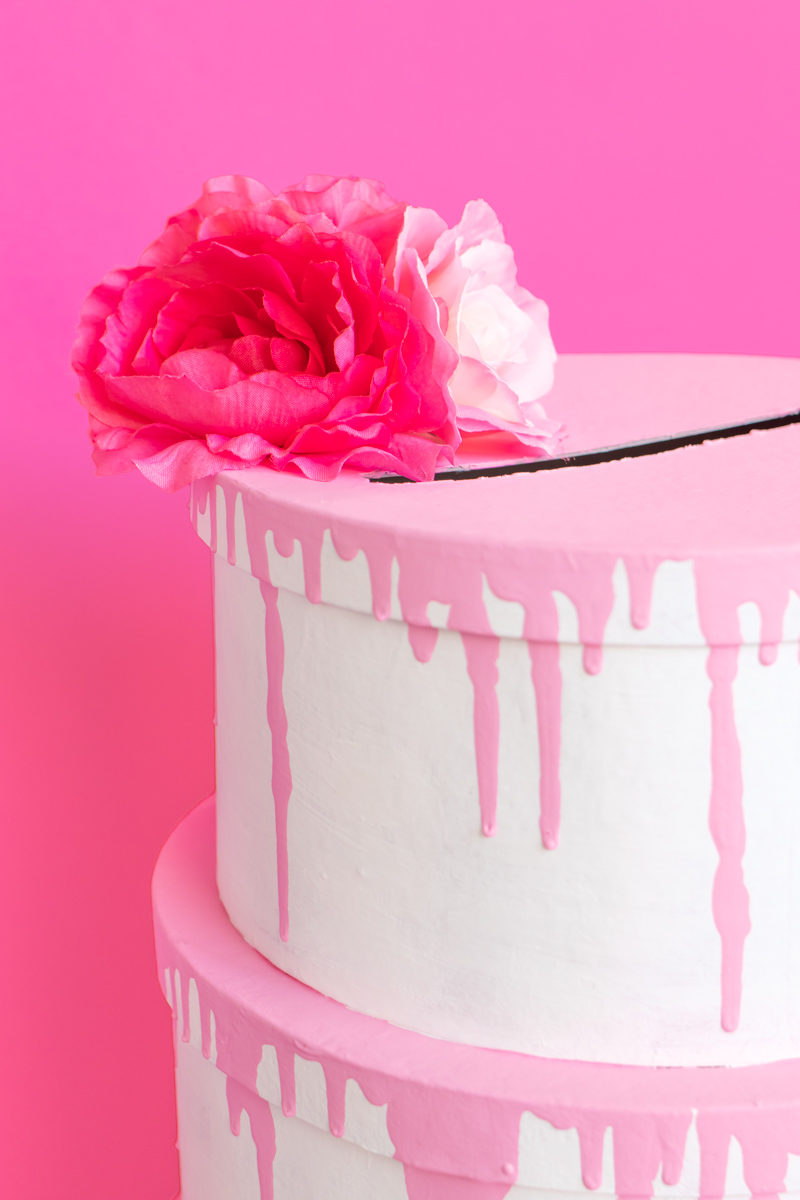 Tiered Cake Card Box DIY // DIY Wedding Card Box // Stack mache boxes into a tiered cake shape with the middles cut out to create a faux cake DIY card box that's perfect for weddings and events! This easy wedding DIY is the perfect way to customize your gift table #weddingdiy #papercrafts #mache #cakedecorating #diywedding #handmadewedding #cardbox