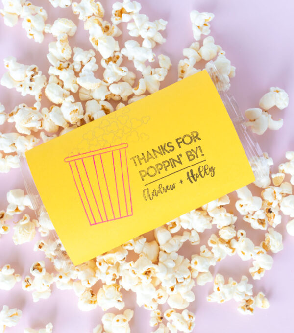 DIY Stamped Popcorn Favors for Weddings | Make your own DIY wedding favors with microwave popcorn! These cute "thanks for POPPING by" popcorn wedding favors use a custom stamp from RubberStamps.com to make a favor guests can easily enjoy at home! #ad #weddingdiy #weddingfavor #partyfavor #stamping #popcorn #papercrafts #diyparty #handmadewedding #colorfulwedding