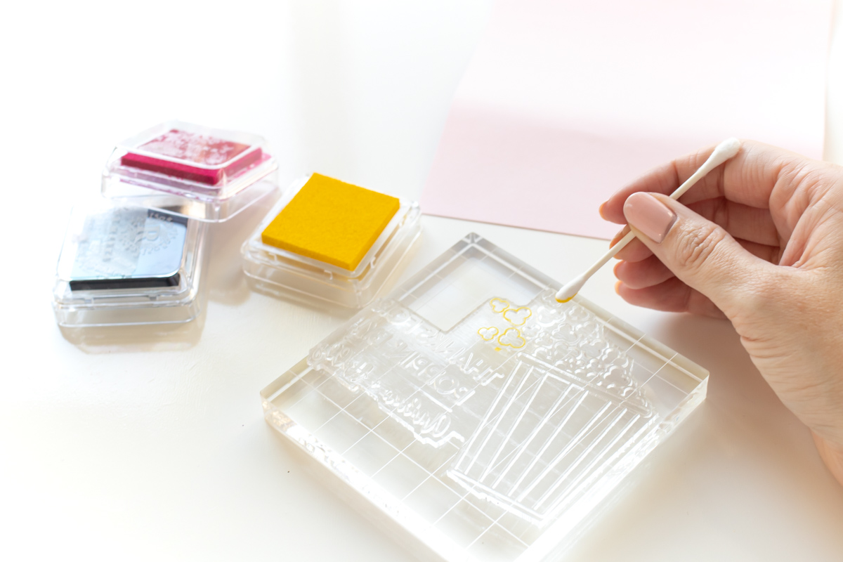 DIY Stamped Popcorn Favors for Weddings | Make your own DIY wedding favors with microwave popcorn! These cute "thanks for POPPING by" popcorn wedding favors use a custom stamp from RubberStamps.com to make a favor guests can easily enjoy at home! #ad #weddingdiy #weddingfavor #partyfavor #stamping #popcorn #papercrafts #diyparty #handmadewedding #colorfulwedding