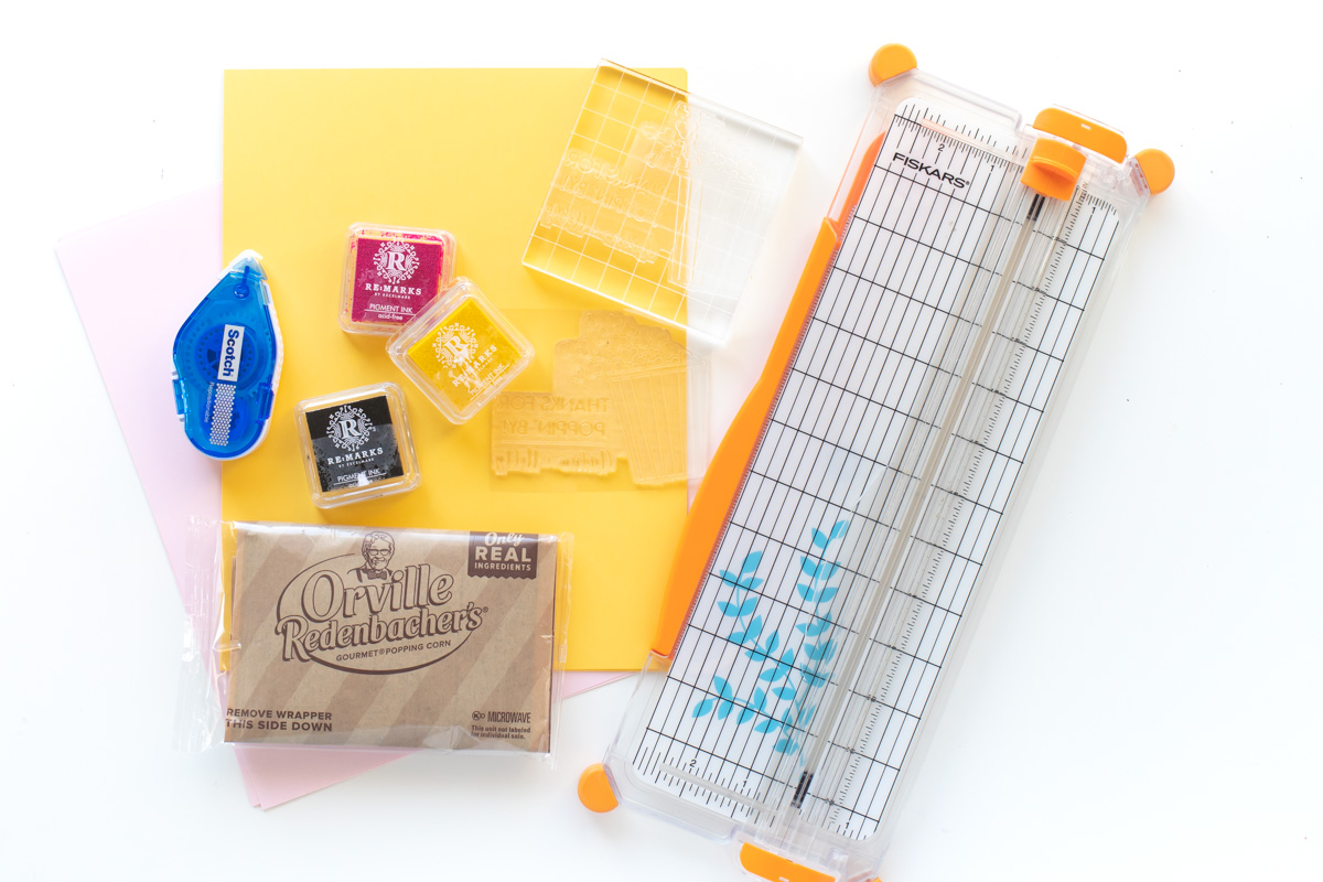 DIY Stamped Popcorn Favors for Weddings | Make your own DIY wedding favors with microwave popcorn! These cute "thanks for POPPING by" popcorn wedding favors use a custom stamp from RubberStamps.com to make a favor guests can easily enjoy at home! #ad #weddingdiy #weddingfavor #partyfavor #stamping #popcorn #papercrafts #diyparty #handmadewedding #colorfulwedding
