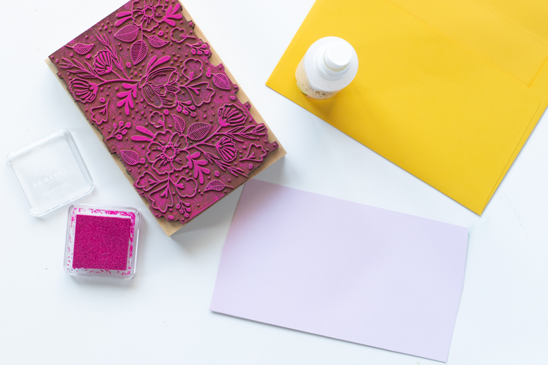DIY Floral Stamped Envelope Liners // Make DIY wedding stationary with these stamped envelope liners using a large floral stamp and inks from RubberStamps.com! Custom envelope liners are the perfect way to make elegant event stationary. Click through for the easy DIY tutorial #ad #weddingdiy #weddingcrafts #papercrafts #stamping #weddingstationary #diystationary #cardmaking #partydiy