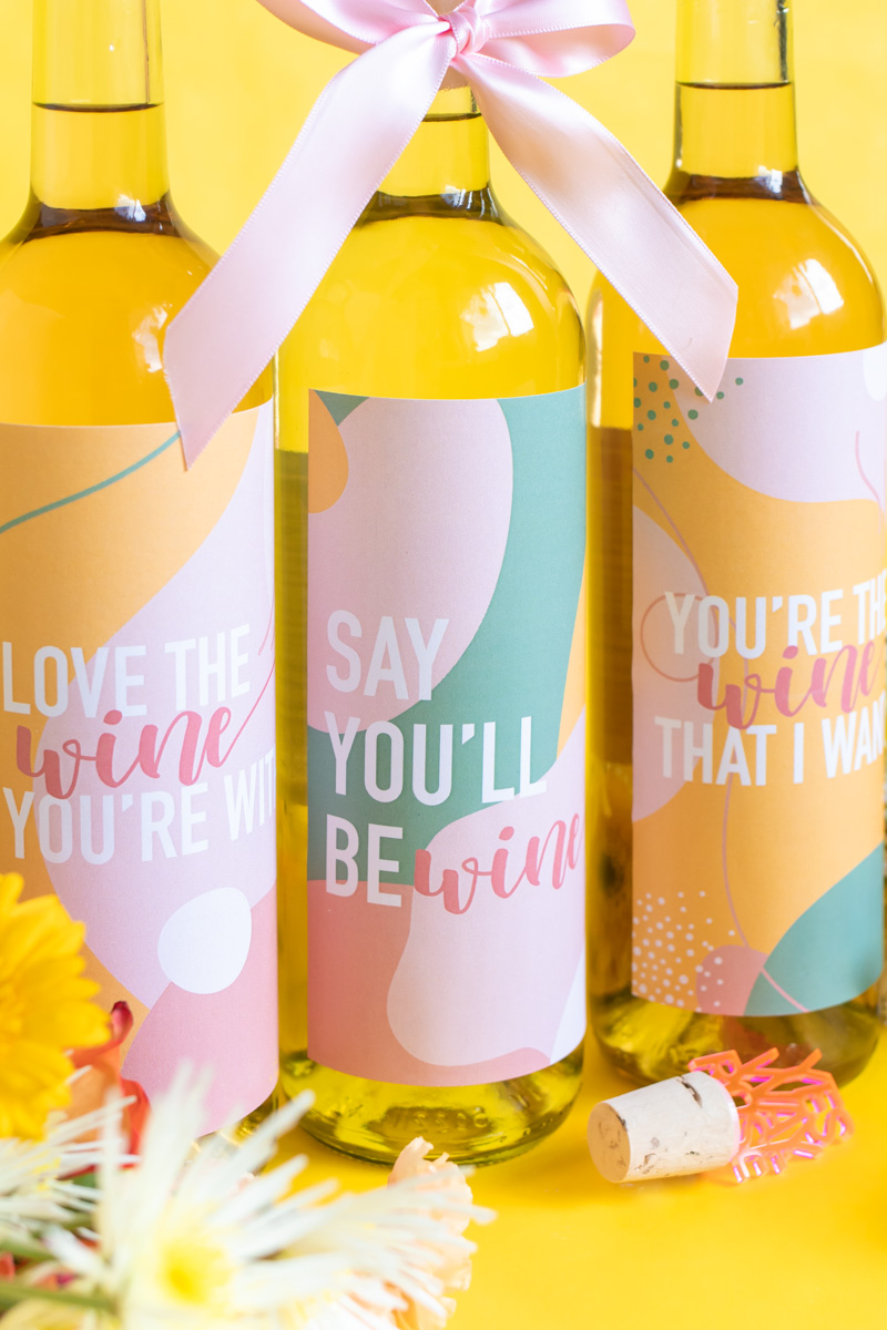 Printable Wine Labels // Easy Galentine's Day Gifts // Download this free printable artwork with wine puns for cute DIY wine labels! Add them to any wine bottle for a sweet semi-homemade gift for Galentine's Day gift for wine lovers! #valentinesday #winelover #stickers diylabels #freeprintable #abstractprint #galentinesday #diygifts #giftideas #giftsforwomen