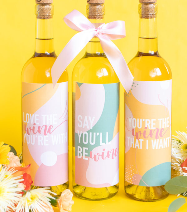 Printable Wine Labels // Easy Galentine's Day Gifts // Download this free printable artwork with wine puns for cute DIY wine labels! Add them to any wine bottle for a sweet semi-homemade gift for Galentine's Day gift for wine lovers! #valentinesday #winelover #stickers diylabels #freeprintable #abstractprint #galentinesday #diygifts #giftideas #giftsforwomen