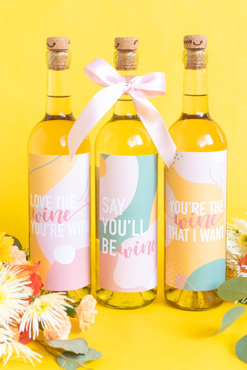 Printable Wine Labels // Easy Galentine's Day Gifts // Download this free printable artwork with wine puns for cute DIY wine labels! Add them to any wine bottle for a sweet semi-homemade gift for Galentine's Day gift for wine lovers! #valentinesday #winelover #stickers diylabels #freeprintable #abstractprint #galentinesday #diygifts #giftideas #giftsforwomen