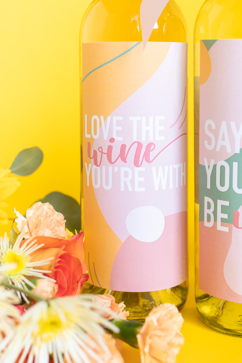 Printable Wine Labels // Easy Galentine's Day Gifts // Download this free printable artwork with wine puns for cute DIY wine labels! Add them to any wine bottle for a sweet semi-homemade gift for Galentine's Day gift for wine lovers! #valentinesday #winelover #stickers diylabels #freeprintable #abstractprint #galentinesday #diygifts #giftideas #giftsforwomen