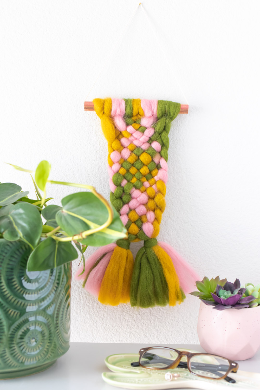 roving weaving wall hanging on white wall