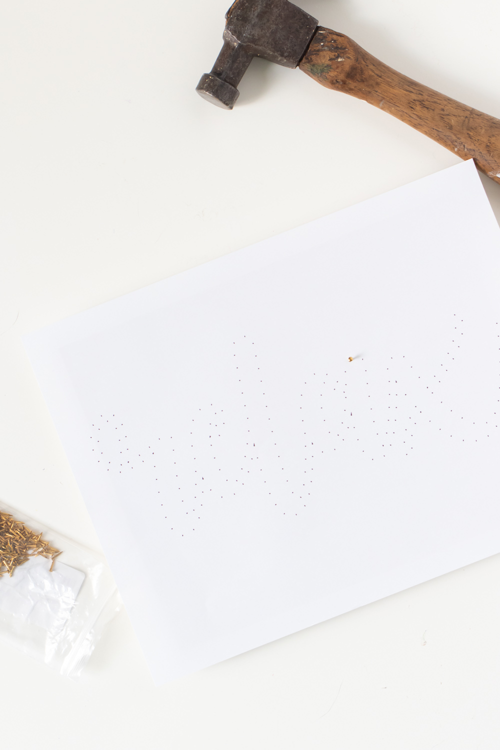 nail on top of string art template