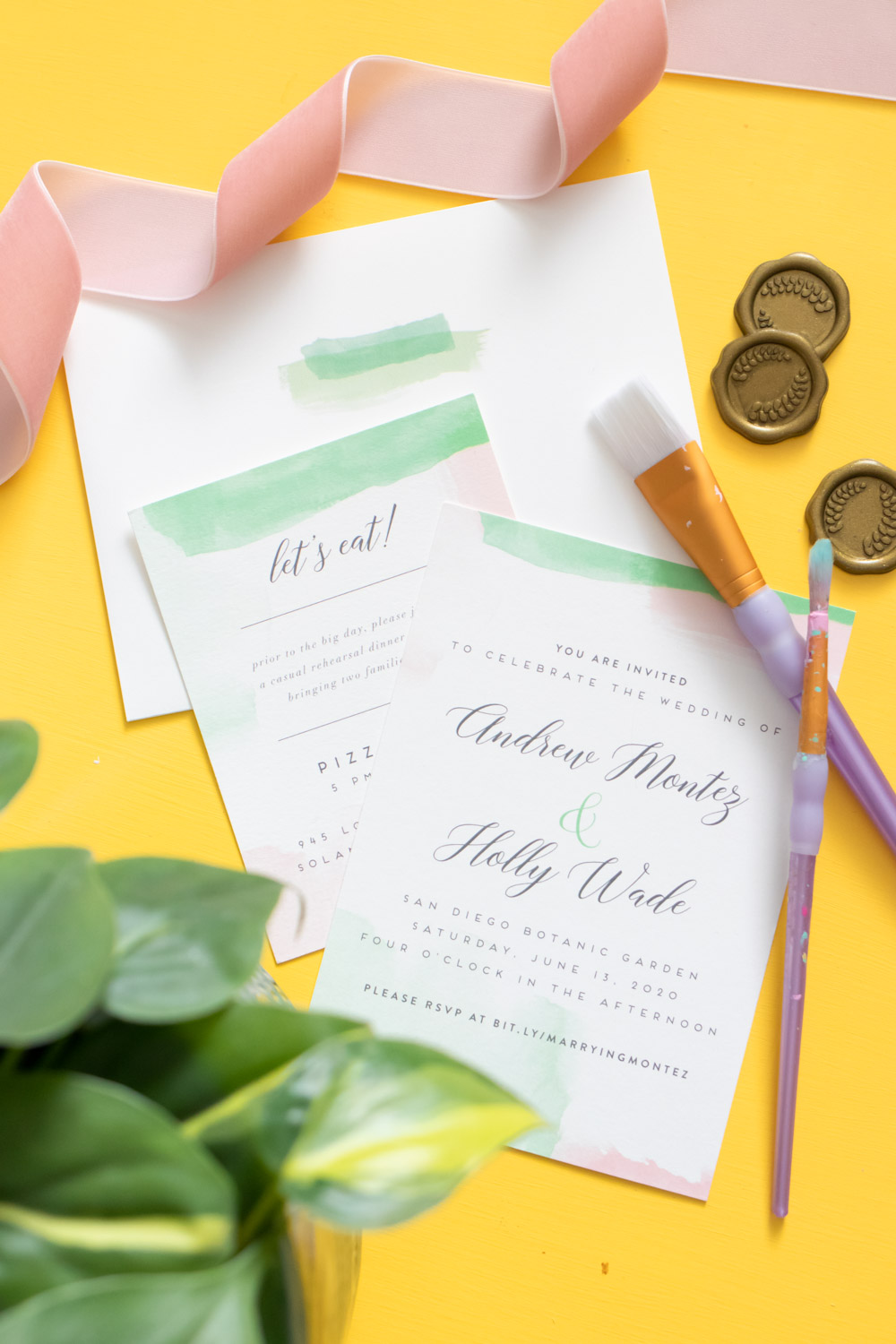 Layered wedding invitations and envelopes