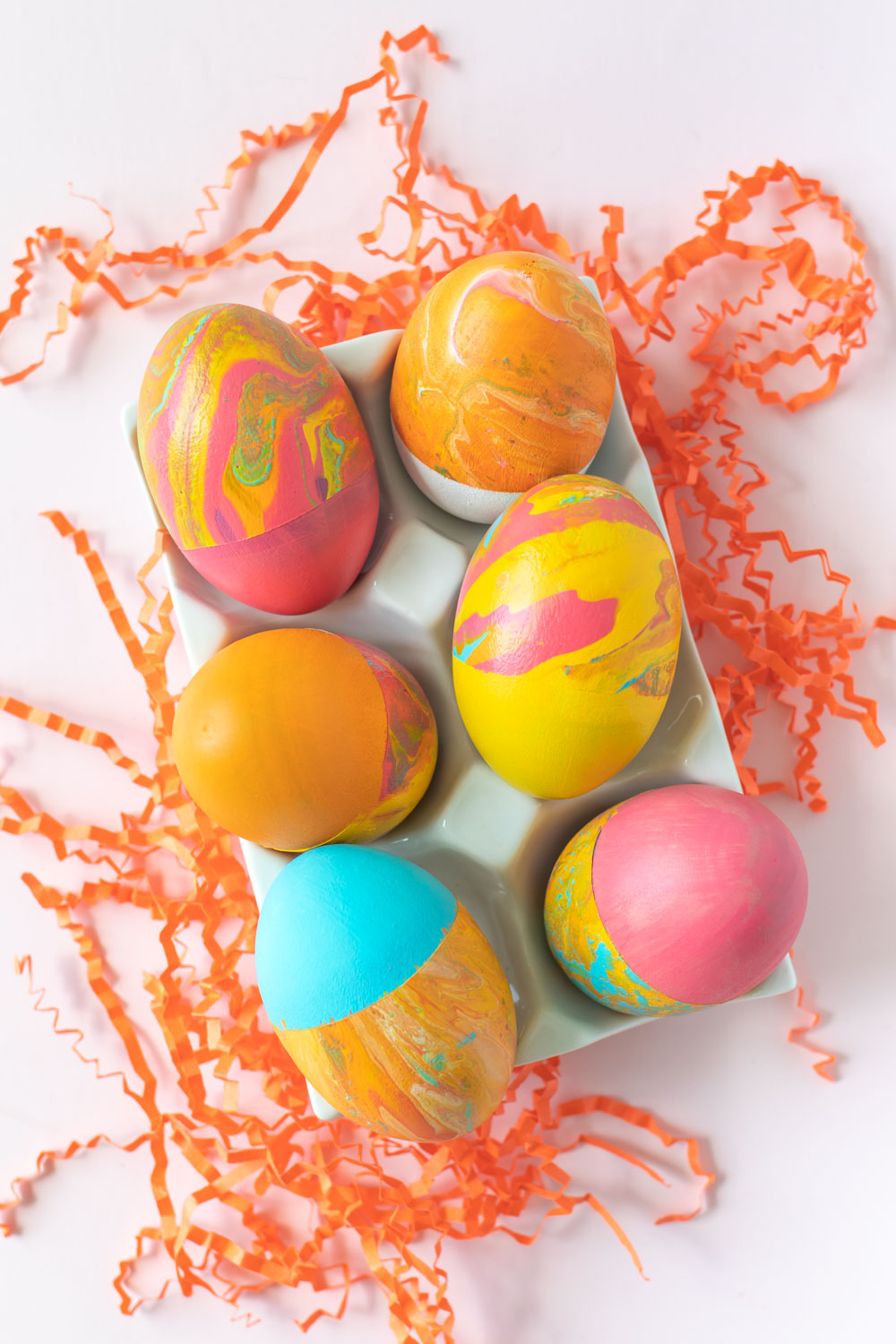 selection of fluid painted easter eggs with color blocking