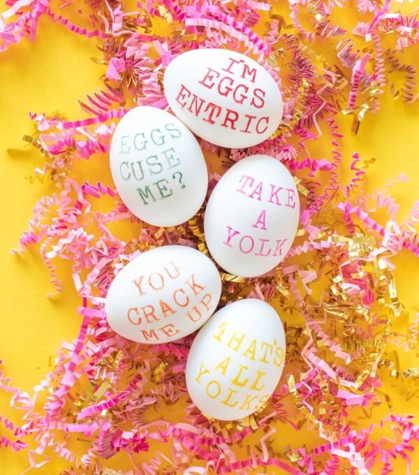 five punny easter eggs on crumpled paper