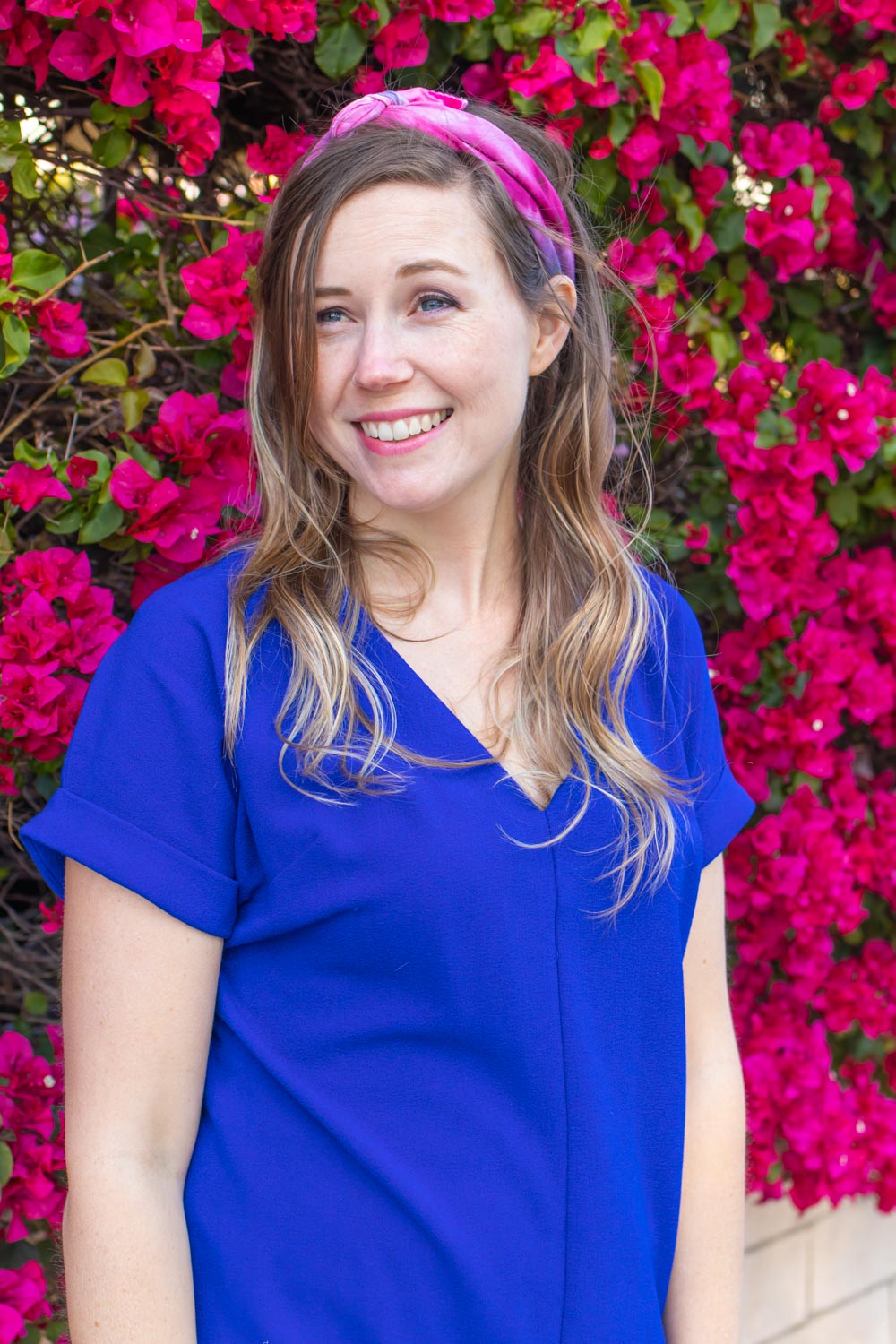 woman wearing tie dye handkerchief as headband