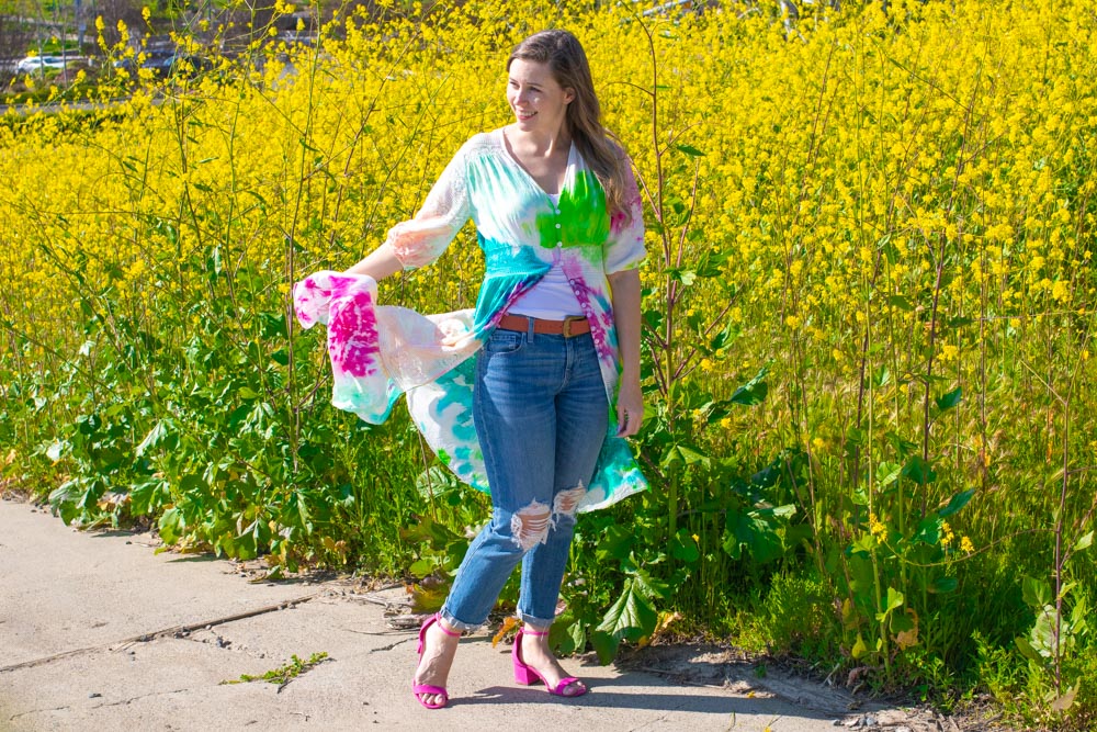 woman wearing tie dye kimono by wildflowers