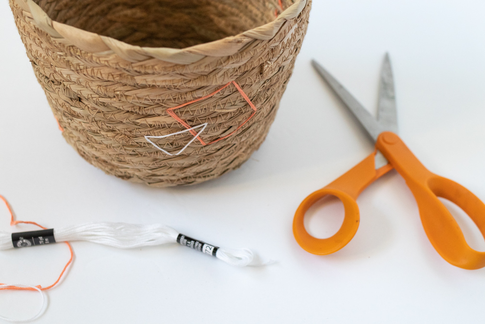 process of embroidering a basket