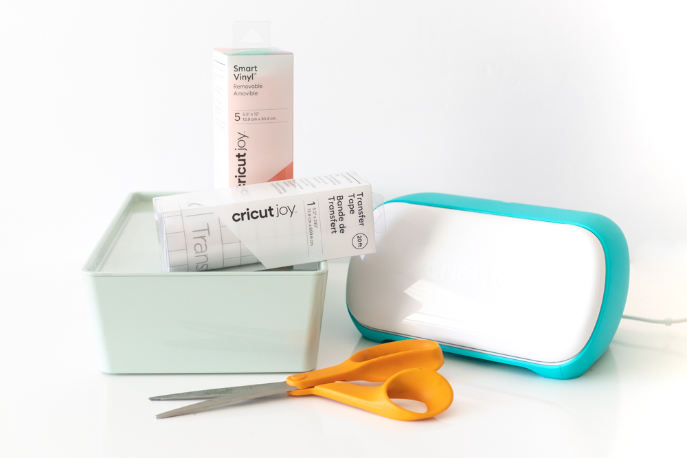 Cricut Joy and supplies for making vinyl labels for storage