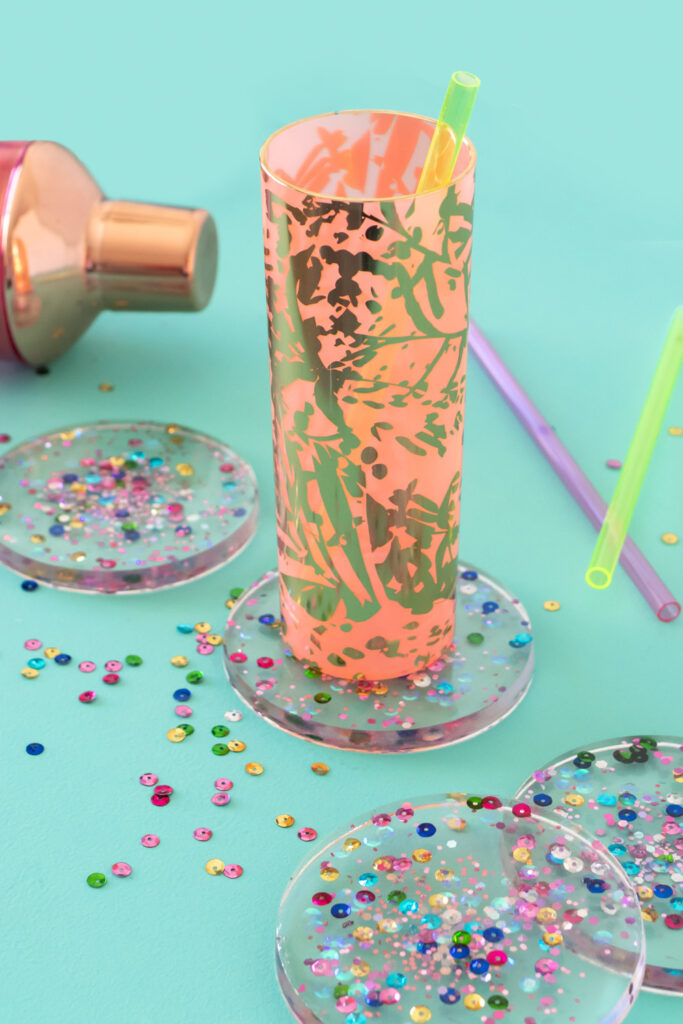 cup resting on confetti resin coasters