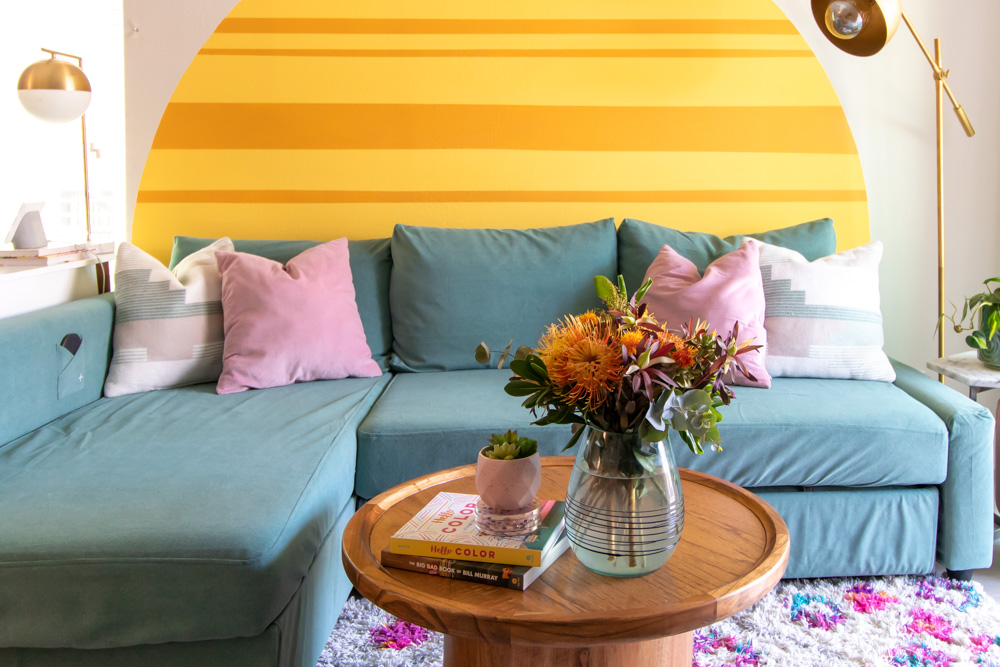 horizontal view of renter-friendly living room with IKEA Friheten sofa update