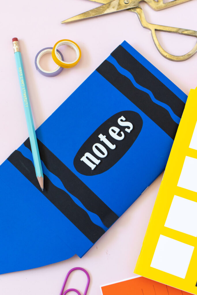 closeup of crayon-shaped easy paper notebooks