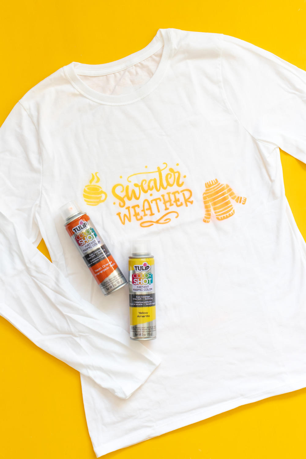 long-sleeve spray paint stenciled t-shirt with paint cans